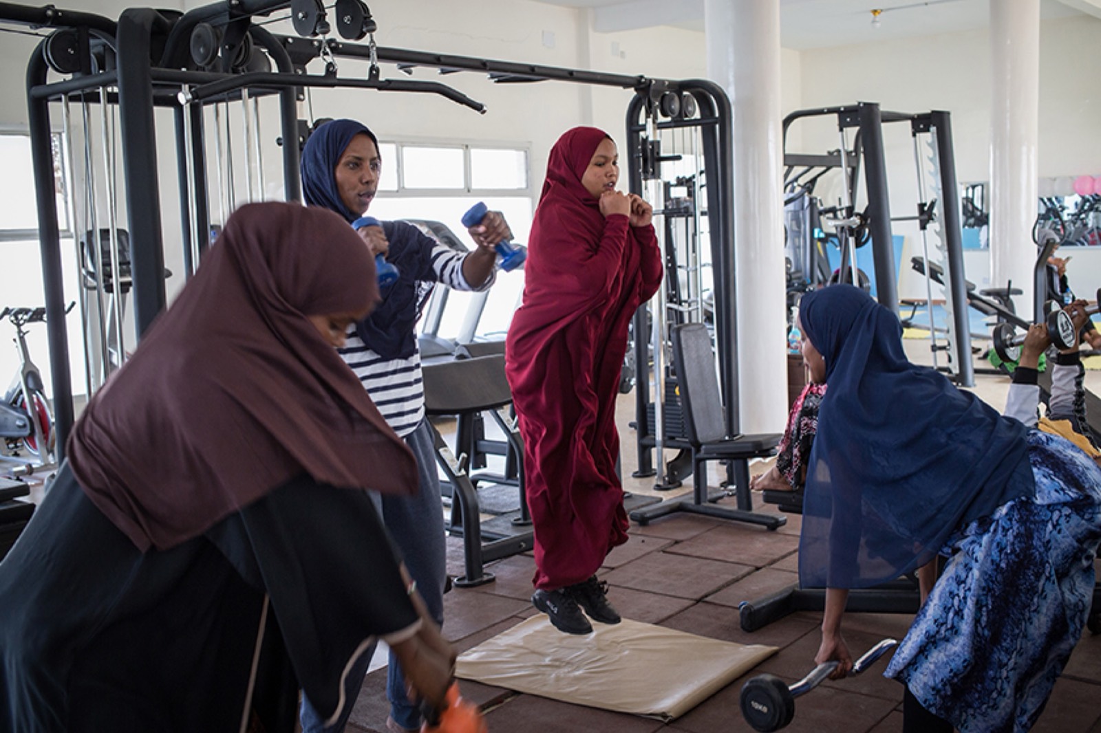 NYT, photo 02. Warda trains women at Ya'niile Gym.