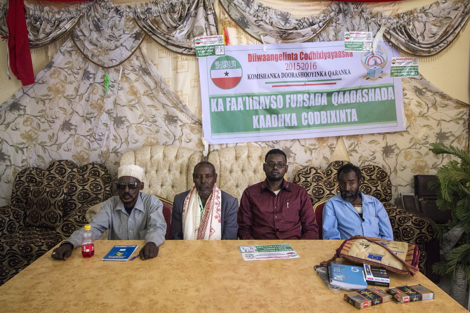 Division Multiplied, photo 17. Elders and clan leaders of the Gabooye in Burao, with the executive director of Adam Academy, an organisation that develops and empowers min