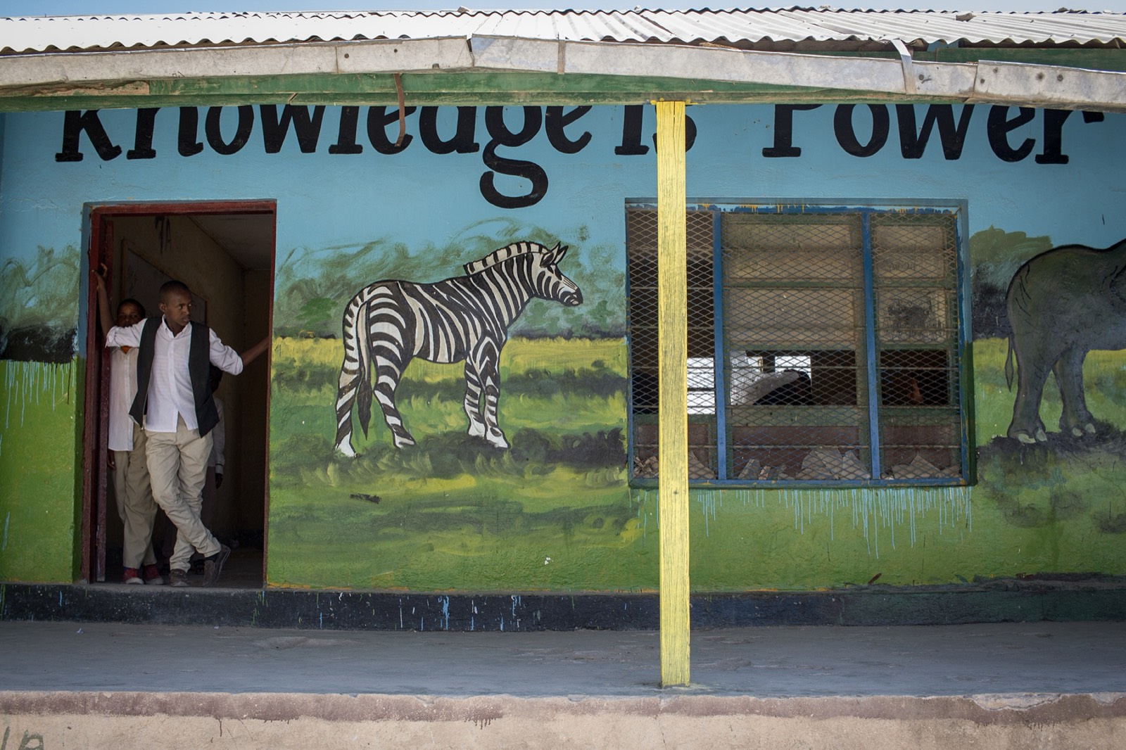 Division Multiplied, photo 19. "Knowledge is Power", written on a wall at a primary school in Kililka, Hargeisa.